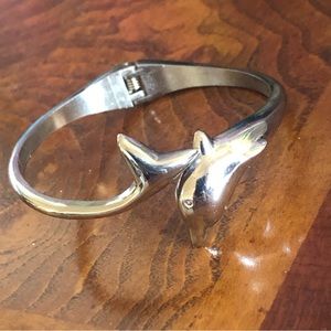 Shiny silver plated dolphin clamp bracelet